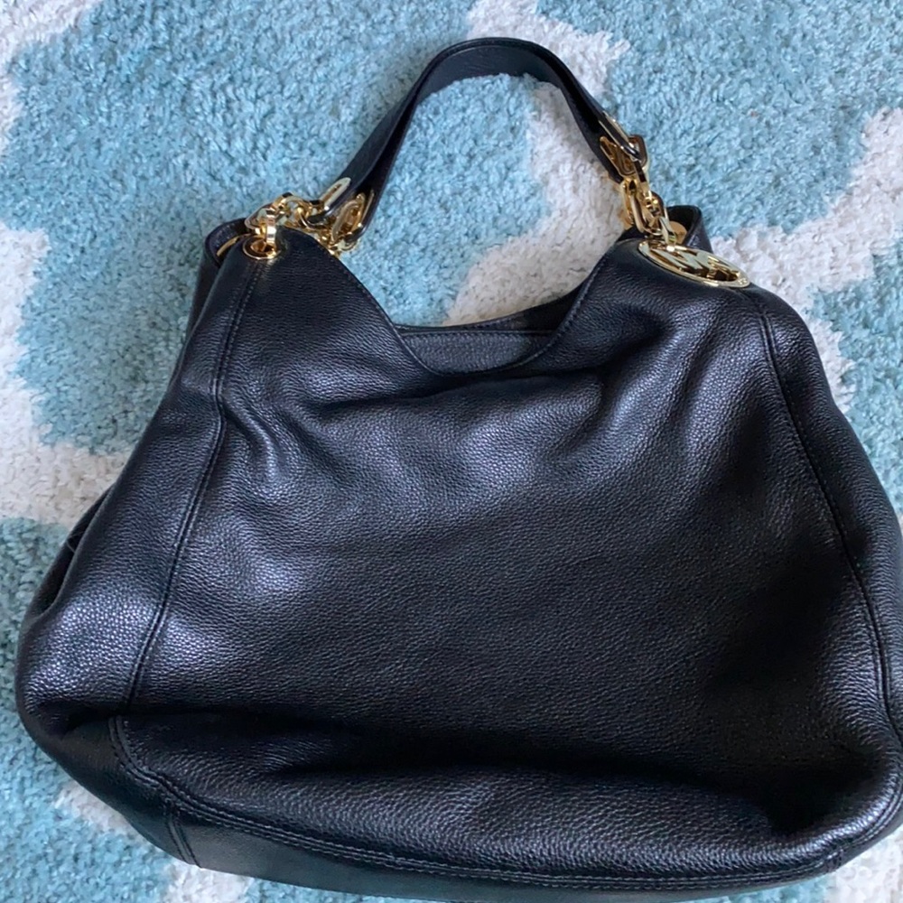 Michael Kors Black Hobo Bag with Gold Accents
